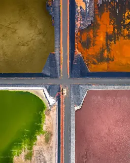 Four tailing ponds at a gas plant as seen from directly above, Western Australia