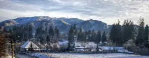 Transylvanian Alps and small village in winter
