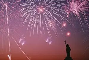 Back Lit Prints: USA, New York City, fireworks on july 4th with silhouette of Statue of Liberty
