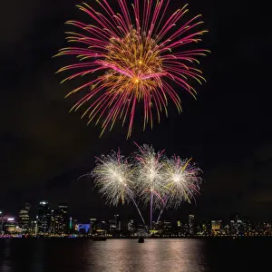 Vibrant multi coloured fireworks display over the Swan river, Perth - Western Australia