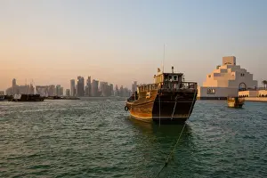 View of Doha Skyline Along Doha Bay With Traditional Dhow in the Foreground and Museum of Islamic Art on the Right, Doha, Qatar