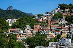 Downtown District Prints: View Of Favelas in Rocinha and Christ The Redeemer At The Top Of Corcovado Mountain