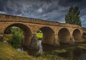 Prints of Southern Lightscapes Australia, 658005452 Perfect Puzzle Prints: A view to the historic convict built bridge at Richmond in southern Tasmania, Australia