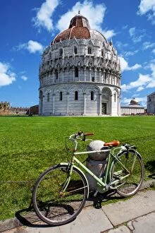 Images Dated 16th June 2013: View of Pisa Baptistry With a Bicycle in the Foreground At Piazza dei Miracoli (Piazza del Duomo)