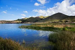 View of Puno City and Surrounding Mountains with Lake Titicaca, Puno, Peru, South America