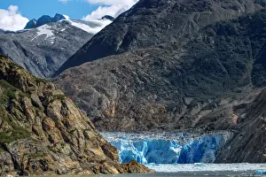 View of South Sawyer Glacier with Alaskan Mountains in Tracy Arm, Alaska, United States of America