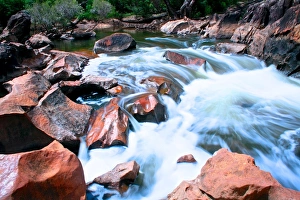 Water rushing over the rocks near Dwellingup Western Australia