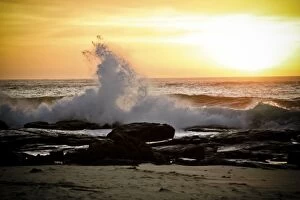 Images Dated 23rd April 2014: Wave and sunset