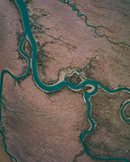 Winding river channel at low tide as seen from drones point of view, Lincolnshire