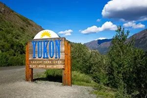 Alaska Us State Prints: A Yukon Welcome Sign on the Border of Alaska with the Northwest and Dempster Highway