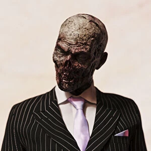 Donald Iain Smith Collection: Zombie: surreal studio portrait of a zombie businessman in suit and tie